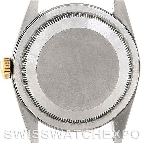 The image shows the case back and crown of a Rolex Datejust 16233 Men's Steel and Gold (two tone) Blue Dial 16233 Men's Steel and Gold (two tone) Blue Dial watch.