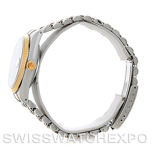 This image shows a side view of a Rolex Datejust 16233 Men's Steel and Gold (two tone) Blue Dial 16233 Men's Steel and Gold (two tone) Blue Dial watch, displaying the case, bezel, crown, and bracelet.