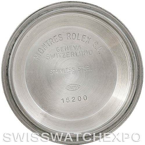 The image shows the inner case back of a Rolex Datejust 16233 Men's Steel and Gold (two tone) Blue Dial 16233 Men's Steel and Gold (two tone) Blue Dial model, engraved with details such as brand, origin, material, and model number.