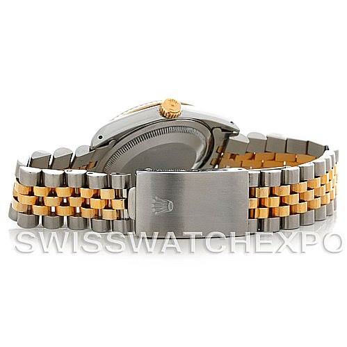 The image shows the Datejust model Rolex watch from the back, highlighting the jubilee bracelet and clasp.