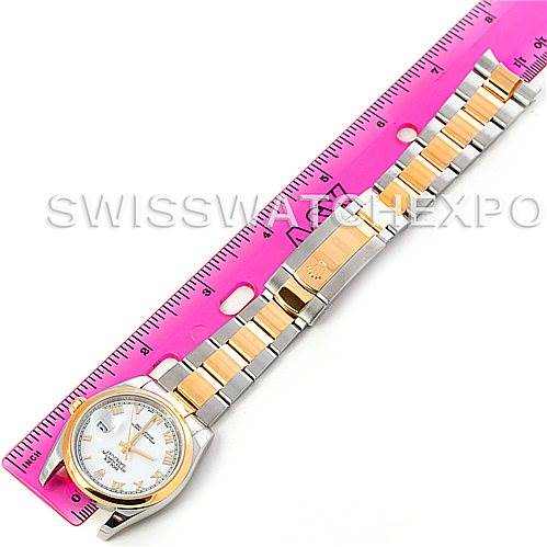 The image shows a Rolex Datejust 116203 Men's Stainless Steel White Dial 116203 Men's Stainless Steel White Dial watch laid flat with the full bracelet, dial, and clasp visible, alongside a pink ruler for scale.