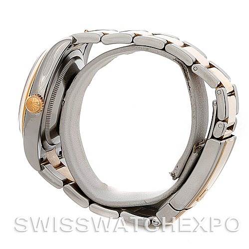 This side view of the Rolex Datejust 116203 Men's Stainless Steel White Dial 116203 Men's Stainless Steel White Dial watch shows the case, crown, and bracelet links.