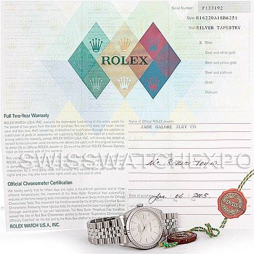 The image shows a Rolex Datejust 16220 Men's Stainless Steel Silver Dial 16220 Men's Stainless Steel Silver Dial watch, documents, and a tag, all viewed from above.