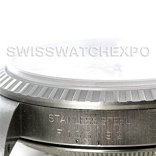 This image shows a close-up side view of the stainless steel case and bezel of a Rolex Datejust 16220 Men's Stainless Steel Silver Dial 16220 Men's Stainless Steel Silver Dial.