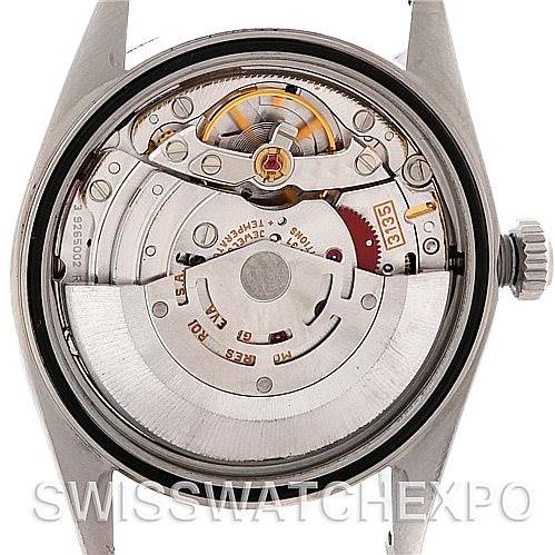 The image shows the inner mechanical movement of a Rolex Datejust 16220 Men's Stainless Steel Blue Dial 16220 Men's Stainless Steel Blue Dial watch from a back angle with the case back removed.