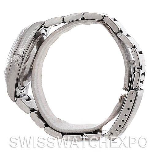 The Rolex Datejust 16220 Men's Stainless Steel Blue Dial 16220 Men's Stainless Steel Blue Dial watch is shown from a side angle, highlighting the bracelet, case, and crown.