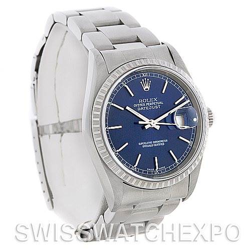The image shows a side angle of the Rolex Datejust 16220 Men's Stainless Steel Blue Dial 16220 Men's Stainless Steel Blue Dial watch, displaying its blue dial, fluted bezel, and stainless steel bracelet.