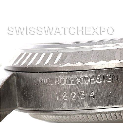The image shows a close-up side view of a Rolex Datejust 16234 Men's Stainless Steel Silver Dial 16234 Men's Stainless Steel Silver Dial model, focusing on the bezel and engraved reference number.