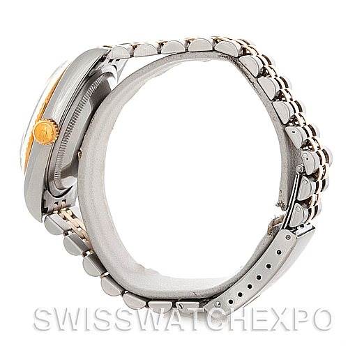 The image shows a side view of a Rolex Datejust 16233 Men's Steel and Gold (two tone) White Dial 16233 Men's Steel and Gold (two tone) White Dial watch, highlighting its crown, case, and bracelet.