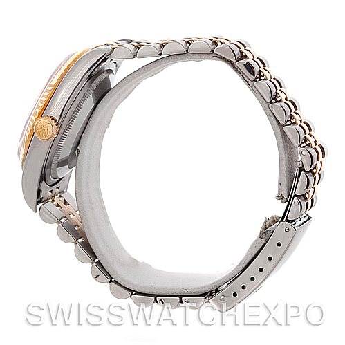 The image shows a side profile of a Rolex Datejust 16233 Men's Steel and Gold (two tone) White Dial 16233 Men's Steel and Gold (two tone) White Dial watch, focusing on the bracelet and crown.