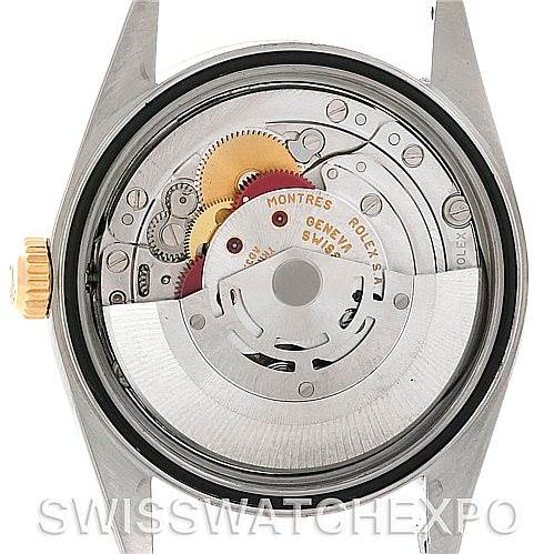 This image shows the back view of a Rolex Datejust 16233 Men's Steel and Gold (two tone) White Dial 16233 Men's Steel and Gold (two tone) White Dial watch, highlighting its internal movement mechanism.