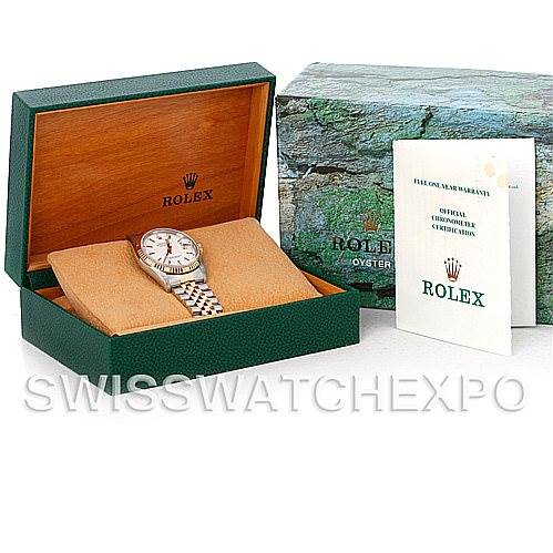 The Rolex Datejust 16233 Men's Steel and Gold (two tone) White Dial 16233 Men's Steel and Gold (two tone) White Dial watch is displayed in an open green and beige box, with warranty cards and additional packaging shown.