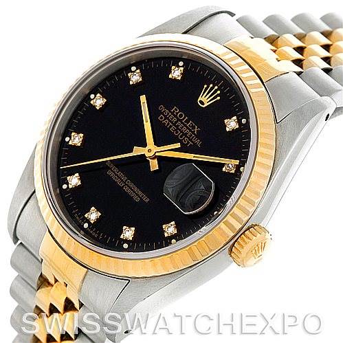 The image shows a Rolex Datejust 16233 Men's Steel and Gold (two tone) Black Dial 16233 Men's Steel and Gold (two tone) Black Dial watch at a slight angle, highlighting its black dial, gold bezel, crown, and two-tone Jubilee bracelet.