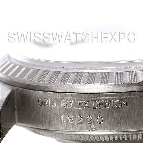 This image shows a close-up of the side of a Rolex Datejust 16220 Men's Stainless Steel Silver Dial 16220 Men's Stainless Steel Silver Dial's case, highlighting the model number 16220 and "ORIG. ROLEX DESIGN" engraving.