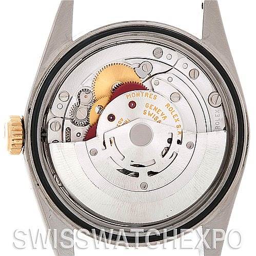 The image shows the back view of a Rolex Datejust 16233 Men's Steel and Gold (two tone) White Dial 16233 Men's Steel and Gold (two tone) White Dial watch, highlighting the internal mechanical movement components.