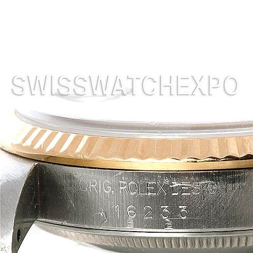 This image shows a close-up of the side of a Rolex Datejust 16233 Men's Steel and Gold (two tone) White Dial 16233 Men's Steel and Gold (two tone) White Dial watch case, highlighting the fluted bezel and model number 16233.