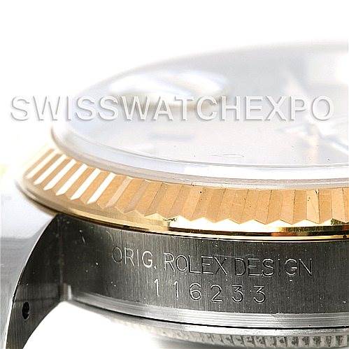 The image shows a close-up angle of the Rolex Datejust 116233CSJ Men
s Stainless Steel Champagne Dial 116233CSJ Men
s Stainless Steel Champagne Dial model, highlighting the bezel and the side of the watch case with the model number 116233.