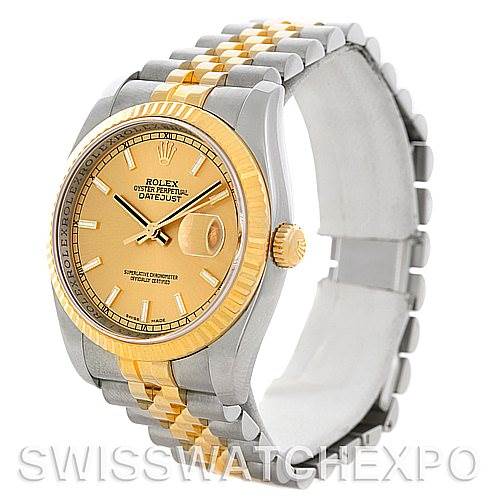 The image shows a Rolex Datejust 116233CSJ Men
s Stainless Steel Champagne Dial 116233CSJ Men
s Stainless Steel Champagne Dial watch from an angle focusing on the dial, bezel, and part of the two-tone bracelet.