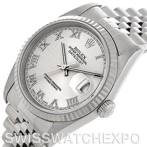 This image shows a Rolex Datejust 16234 Men's Stainless Steel Silver Dial 16234 Men's Stainless Steel Silver Dial watch from an angled top view, highlighting the dial, fluted bezel, and Jubilee bracelet.