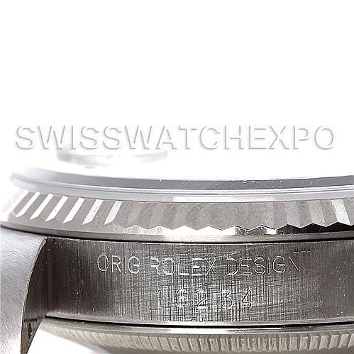 The image shows a close-up of the side of a Rolex Datejust 16234 Men's Stainless Steel Blue Dial 16234 Men's Stainless Steel Blue Dial watch, highlighting the engraved design number.