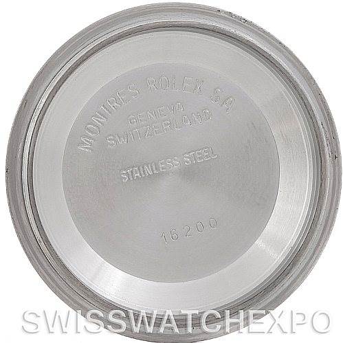 The image shows the interior of a stainless steel case back for a Rolex Datejust 16234 Men's Stainless Steel Blue Dial 16234 Men's Stainless Steel Blue Dial model with engravings indicating brand and location.