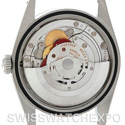 The image shows the back view of a Rolex Datejust 16234 Men's Stainless Steel Blue Dial 16234 Men's Stainless Steel Blue Dial watch, displaying its intricate inner mechanism.