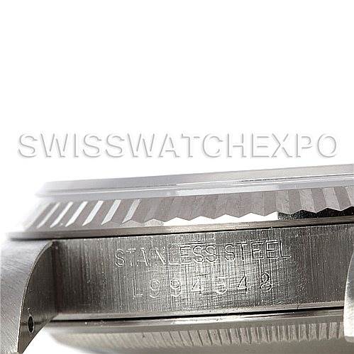 This image shows a side view of the stainless steel case and fluted bezel of a Rolex Datejust 16234 Men's Stainless Steel Blue Dial 16234 Men's Stainless Steel Blue Dial watch.