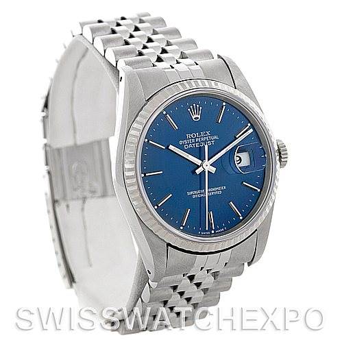 This image shows a Rolex Datejust 16234 Men's Stainless Steel Blue Dial 16234 Men's Stainless Steel Blue Dial watch, angled to display the blue dial, silver bracelet, and fluted bezel.