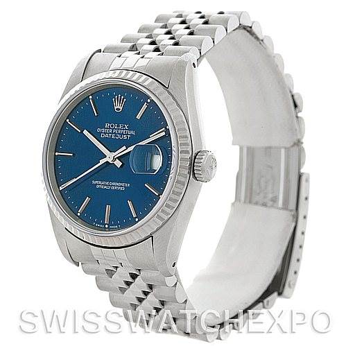 The watch is a Rolex Datejust 16234 Men's Stainless Steel Blue Dial 16234 Men's Stainless Steel Blue Dial model shown from a front-left angle, displaying the face, bezel, crown, and part of the bracelet.