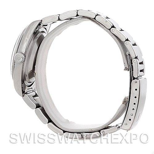 This image shows the side profile of a Rolex Datejust 16220 Men's Stainless Steel Silver Dial 16220 Men's Stainless Steel Silver Dial watch, focusing on its case, crown, and bracelet.