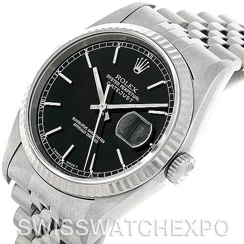 This image shows the Rolex Datejust 16234 Men's Stainless Steel Black Dial 16234 Men's Stainless Steel Black Dial watch from a front-left angle, highlighting its black dial, fluted bezel, and Jubilee bracelet.