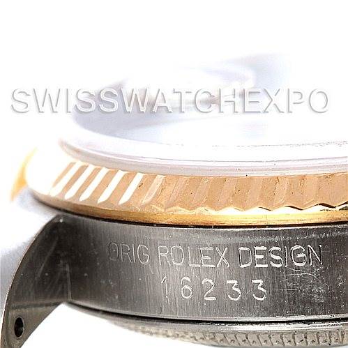 The image shows a close-up view of the side of a Rolex Datejust 16233 Men's Steel and Gold (two tone) Blue Dial 16233 Men's Steel and Gold (two tone) Blue Dial watch, focusing on the bezel and the engraved model number 16233.