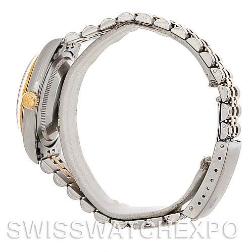 This image shows a side view of a Rolex Datejust 16233 Men's Steel and Gold (two tone) Blue Dial 16233 Men's Steel and Gold (two tone) Blue Dial watch, highlighting the case, crown, and bracelet with a closed clasp.