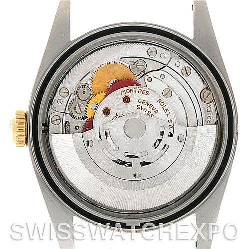 This image shows the inner mechanism and movement of a Rolex Datejust 16233 Men's Steel and Gold (two tone) Blue Dial 16233 Men's Steel and Gold (two tone) Blue Dial watch from a rear view angle.
