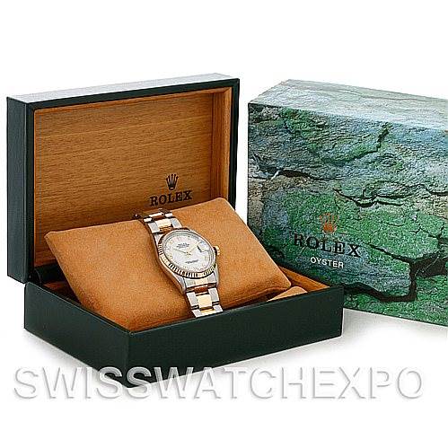 The image shows a Rolex Datejust 16233 Men's Steel and Gold (two tone) White Dial 16233 Men's Steel and Gold (two tone) White Dial watch displayed in an open green box with the Rolex logo, next to its closed box lid.