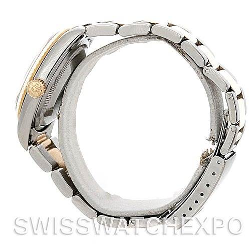 The image shows a side view of a Rolex Datejust 16233 Men's Steel and Gold (two tone) White Dial 16233 Men's Steel and Gold (two tone) White Dial watch, highlighting the crown, case, and part of the bracelet.