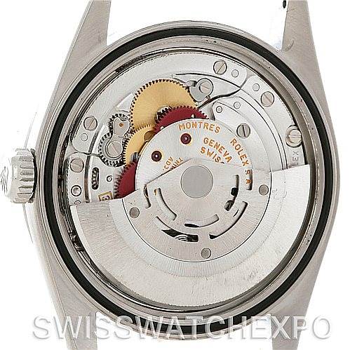 The image shows the back view of a Rolex Datejust 16200 Men's Stainless Steel Blue Dial 16200 Men's Stainless Steel Blue Dial watch, highlighting its internal movement and mechanical parts.