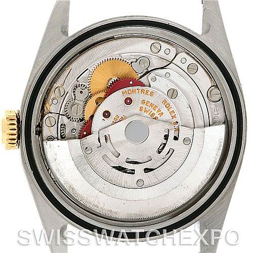 The image shows the back view of a Rolex Datejust 16233 Men's Steel and Gold (two tone) White Dial 16233 Men's Steel and Gold (two tone) White Dial watch, highlighting its internal movement mechanism.