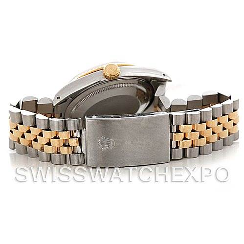The image shows the back and bracelet of a Rolex Datejust 16233 Men's Steel and Gold (two tone) White Dial 16233 Men's Steel and Gold (two tone) White Dial model watch, featuring a two-tone metal design.