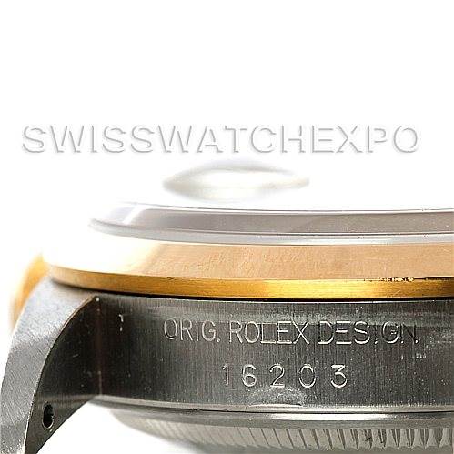 The image shows a side view of a Rolex Datejust 16203 Men
s Steel and Gold (two tone) White Dial 16203 Men
s Steel and Gold (two tone) White Dial watch case with the model number 16203 engraved, focusing on the bezel and part of the watch case.