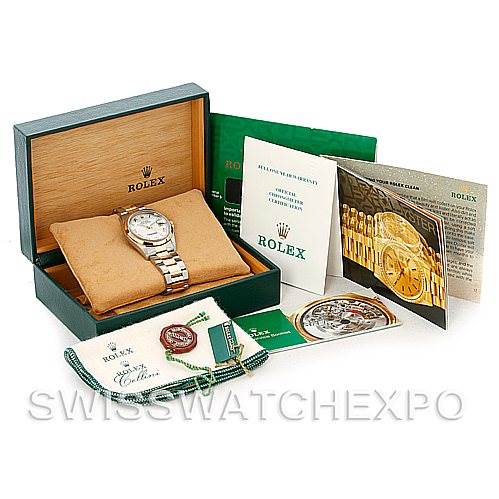 The image shows a Rolex Datejust 16203 Men
s Steel and Gold (two tone) White Dial 16203 Men
s Steel and Gold (two tone) White Dial watch with its box, warranty card, manuals, and accessories, including tags and a cloth.