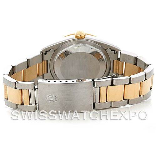 The image shows the back view of a Rolex Datejust 16203 Men
s Steel and Gold (two tone) White Dial 16203 Men
s Steel and Gold (two tone) White Dial watch, highlighting its clasp, bracelet, and case back.