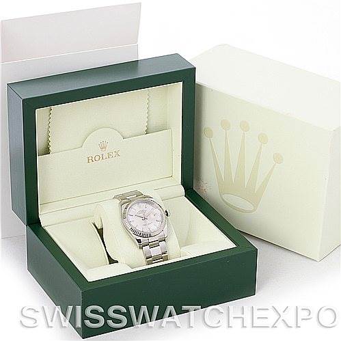 The image shows a Rolex Datejust 116234 Men's Stainless Steel Silver Dial 116234 Men's Stainless Steel Silver Dial watch displayed in its open green box, with a cream-colored outer box beside it.