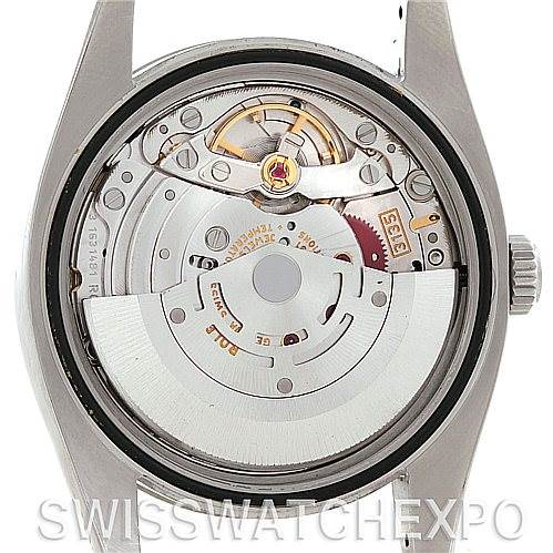 This image shows the intricate inner mechanism of a Rolex Datejust 116234 Men's Stainless Steel Blue Dial 116234 Men's Stainless Steel Blue Dial watch viewed from the back.