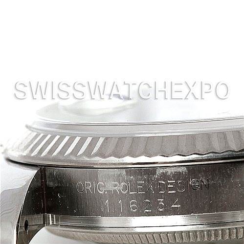 This image shows the side of a Rolex Datejust 116234 Men's Stainless Steel Blue Dial 116234 Men's Stainless Steel Blue Dial watch case, focusing on the bezel and the engraved model number.