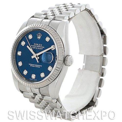 This image shows a Rolex Datejust 116234 Men's Stainless Steel Blue Dial 116234 Men's Stainless Steel Blue Dial watch at a slight angle, highlighting its blue dial, diamond hour markers, fluted bezel, and Jubilee bracelet.
