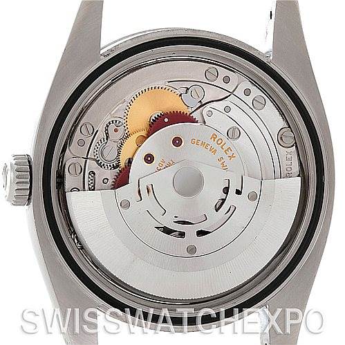 This image shows the back view of a Rolex Datejust 116234 Men's Stainless Steel White Dial 116234 Men's Stainless Steel White Dial watch, highlighting its internal movement and components.