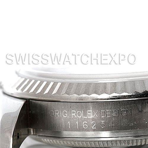 The image shows a close-up of the side of a Rolex Datejust 116234 Men's Stainless Steel White Dial 116234 Men's Stainless Steel White Dial watch, highlighting the bezel and the engraved case with "ORIG. ROLEX DESIGN" and a serial number.