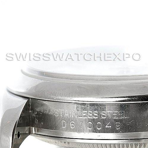 This image shows a close-up of the side of a Rolex Datejust 116200 Men's Stainless Steel White Dial 116200 Men's Stainless Steel White Dial watch, highlighting the stainless steel case and its serial number.