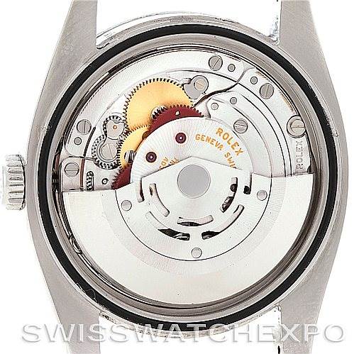 This image shows the movement and internal mechanisms of a Rolex Datejust 116200 Men's Stainless Steel White Dial 116200 Men's Stainless Steel White Dial watch from a rear angle.